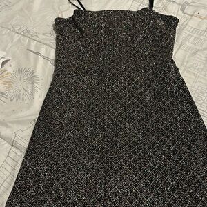 Beautiful black dress  never wear it it just been on my clothes for 1 years now